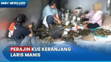 Perajin Kue Keranjang...