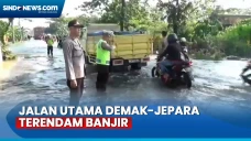 Terendam Banjir, Jalan...
