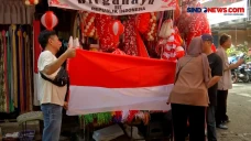 Pedagang Bendera Berlomba...