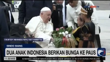 Dua Anak Berpakaian...