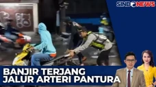 Banjir Terjang Jalan...
