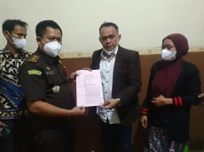 Terbebas Status Tersangka,...