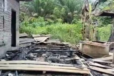Rumah Tersangka Pembunuhan...