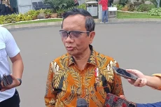 Mahfud MD: Polri Harus...