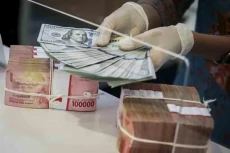 Rupiah Sore Ini Ditutup...
