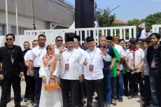 Akhmad Syaikhu-Ilham...