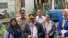 Normalisasi Kali Ciliwung:...