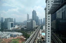 Bank Dunia Pangkas Proyeksi...