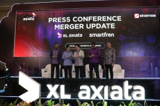Pemegang Saham XL Axiata...