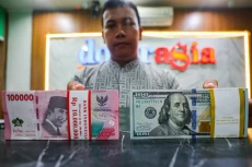 Rupiah Melemah Tipis...