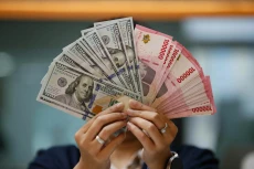 Rupiah Ditutup Melemah...