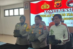 Polisi Tangkap 2 Warga...