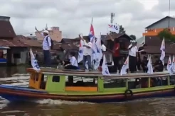 Partai Perindo Ikut Ramaikan Kirab Pemilu 2024 Susuri Sungai Martapura Banjarmasin