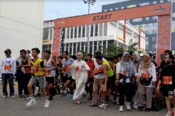 Warga Kota Jambi dan Caleg Perindo Angel Lelga Ikuti Maraton dan Jalan Santai Relawan Ganjar-Mahfud