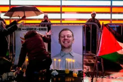 Profil Aaron Bushnell,...
