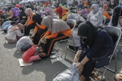2.000 Anak Ikuti Aksi Cuci Kaki Ibu di Jakarta