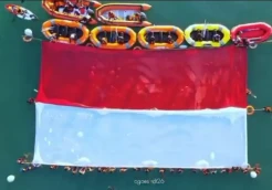 Pembentangan Bendera Merah Putih Raksasa di Situ Gintung Meriahkan HUT RI ke-80