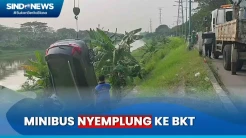 Minibus Nyemplung ke Banjir Kanal Timur, Evakusi Berlangsung Sulit