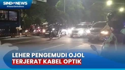 Ngeri! Leher Pengemudi Ojol Terjerat Kabel Optik di Jalan Matraman