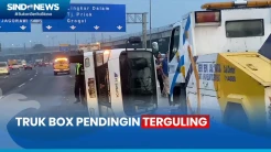 Diduga Sopir Hilang Kendali, Truk Box Pendingin Terguling di Tengah Ruas Tol Japek