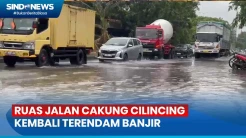 Hujan Deras Akibatkan Ruas Jalan Cakung Cilincing Jaktim Terendam Banjir