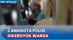 2 Anggota Polisi Dikeroyok...