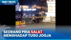Viral Pria Berpakaian Serba Hitam Salat Menghadap Tugu Jogja