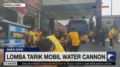 Rayakan HUT ke-79 RI, Polisi Cirebon Gelar Lomba Tarik Mobil Water Canon