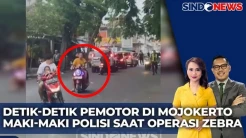 Pemotor Tantang Polisi...