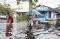 Dampak Banjir Luapan...