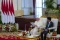 Jokowi Sambut Hangat...
