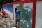 Potret Melukis Mural...