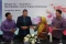 XL Axiata dan Smartfren...