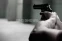 floating-Pria Acungkan Pistol...