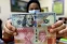 floating-Rupiah Tembus Rp17.000/USD,...