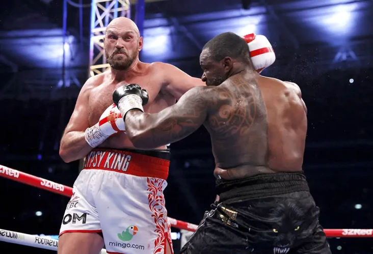 Tyson Fury Pertahankan...