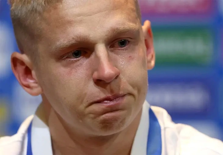 Sambil Menangis, Oleksandr...
