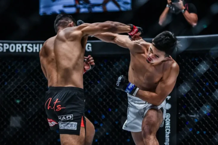 Menang TKO, Christian...