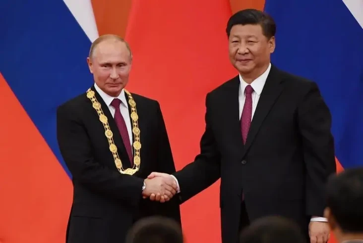 Apakah China Membantu...