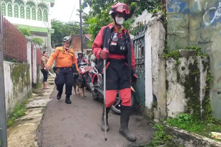 Anjing Pelacak Bantu...