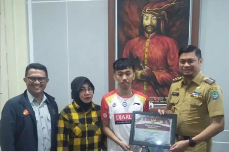 Raih Medali Perak pada...