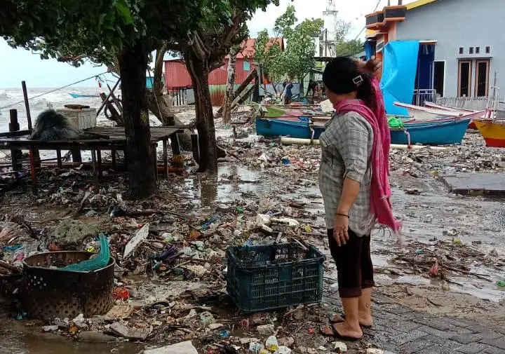 Dampak Cuaca Ekstrem,...