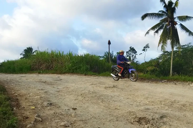 Perbaikan Jalan Menuju...