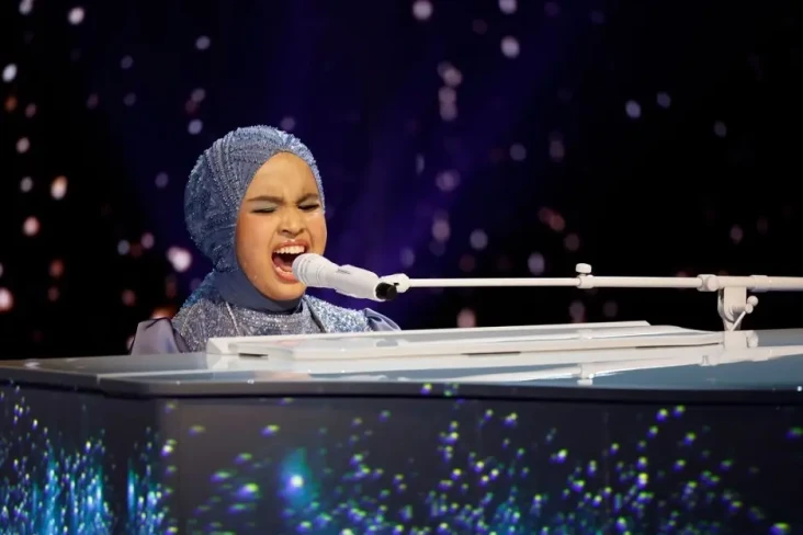 Putri Ariani Bawakan...