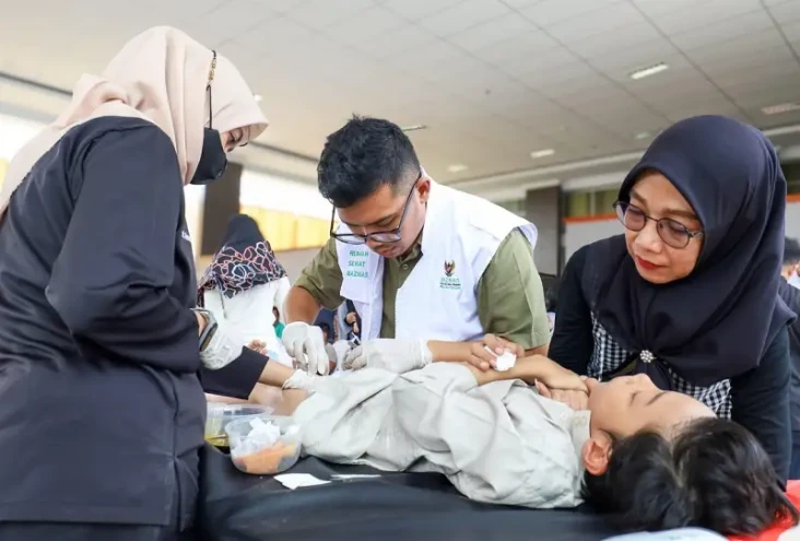 Baznas bersama WOM Finance...