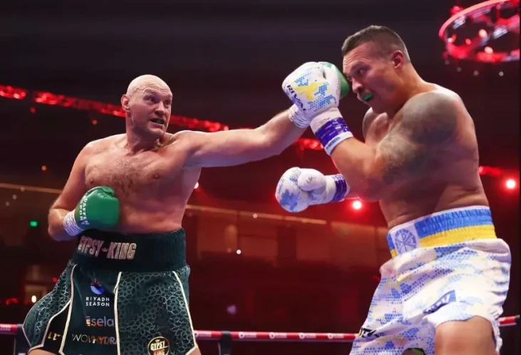 Tyson Fury Pertahankan...