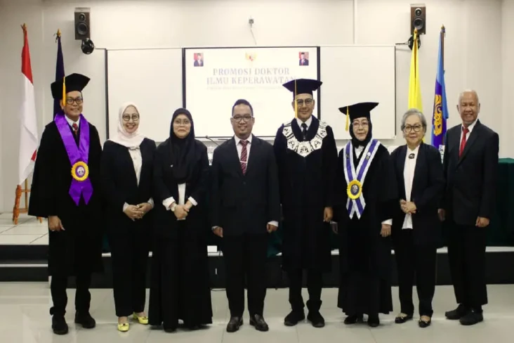Raih Gelar Doktor dengan...
