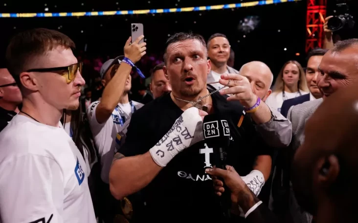Oleksandr Usyk Pertahankan...