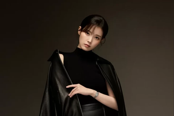 IU Tunda Konser dan...