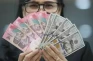 Rupiah Loyo ke Rp16.798,...